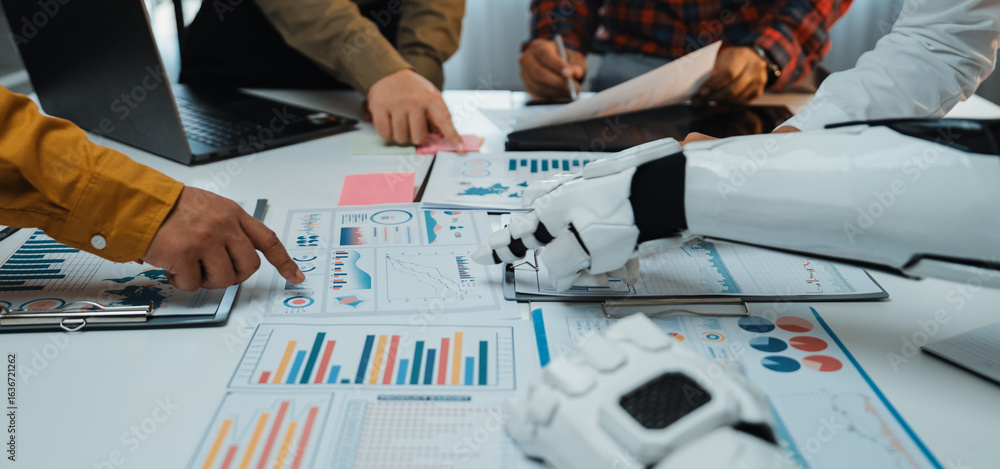 Poster a robot arm collaborates with team members during a business meeting, analyzing charts and graphs to