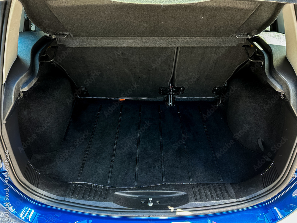Poster discover the spacious hatchback trunk with a sleek dark fabric finish and functional storage options