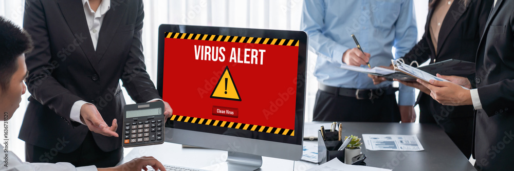 Poster virus warning alert on computer screen detected brisk cyber threat , hacker, computer virus and malw