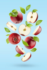 Ripe red apples with green leaves fly as swirl on pastel blue white background as art composition, with whole, half, quarter fruit, shadow. Summer juicy fruits for advertising, design, label product.