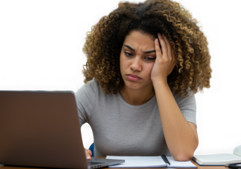 Frustrated woman studying with laptop and books