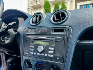 The modern car interior comes equipped with an advanced audio system that offers highquality sound,...