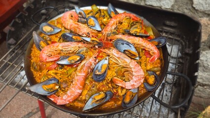 Authentic spanish paella with seafood delights for culinary enthusiasts. Typical cuisine of Spain....