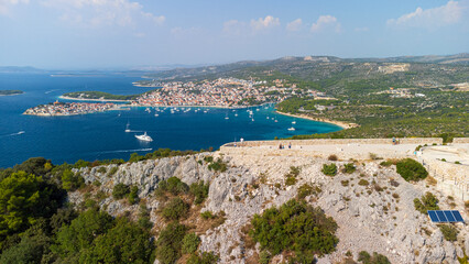 Panoramic view of the town of Primošten from the statue of Our Lady of Loreto. Aerial view of the...