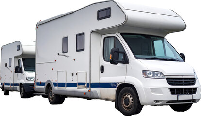 Fototapeta premium Two white camper vans parked in parking lot on cloudy day