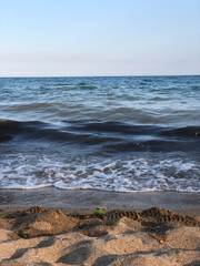 summer beach at sea at sunset