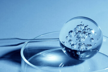 Abstract cosmetic laboratory. Chemical laboratory research. Cosmetic Essence. Bubbles in Glass Sphere