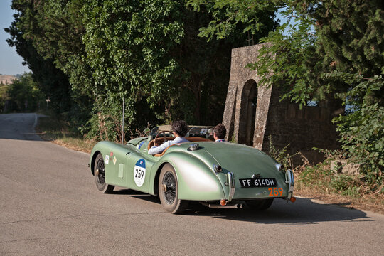 Vintage sports car Jaguar XK 120 OTS Roadster (1952) in classic car race Mille Miglia, on June 20, 2025 in Predappio, FC, Italy