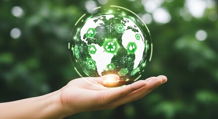 Hand holding a glowing green earth with recycling symbols and nature background