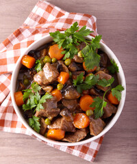 stew with mushrooms, carrot and peas