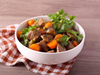 stew with mushrooms, carrot and peas