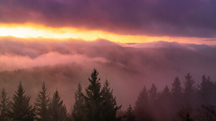 A breathtaking sunset over the Northern Black Forest in Germany. The sky glows with vibrant colors,...