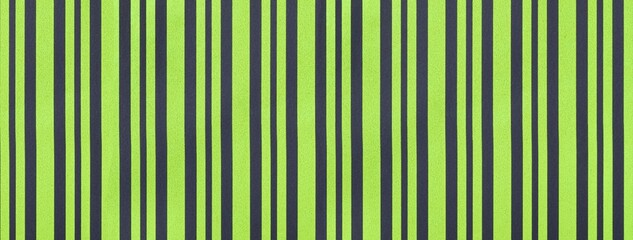 Striped green and olive wrapping paper texture with pattern of vertical black lines on holiday...