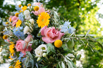 Wedding floral arrangement in a beautiful garden setting