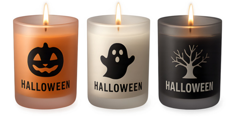 Three candles with Halloween designs on them