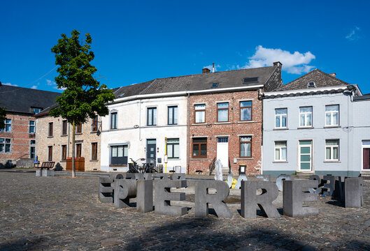 Colorful houses in a row in the village of Arquennes Seneffe, Hainaut, Belgium
