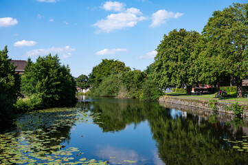 Fototapeta premium Landscape view over the Ancien Canal du Centre in Seneffe, Hainaut, Belgium