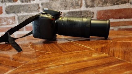 camera on a wooden table