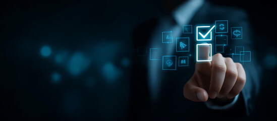 Fototapeta premium Businessman's hand pointing to a checklist with a box and an AI icon, representing a business plan, 