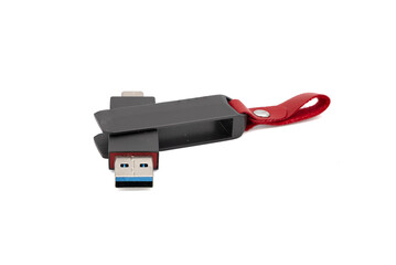 Dual-Port USB Flash Drive with Black Casing and Red Leather Strap Isolated on White