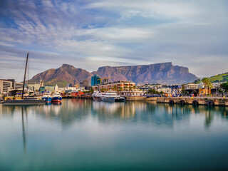Long exposure shot of V&A Waterfront with Table Mountain at sunset, Cape Town, South Africa