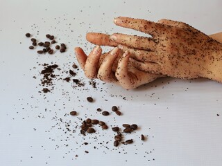 Female hands with natural cofee scrab, promoting eco-friendly body care and zero waste skincare. Organic exfoliation treatmentnon white backround