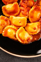 Ravioli beef tomato sauce second course fresh delicious gourmet food background on the table rustic food top view copy space