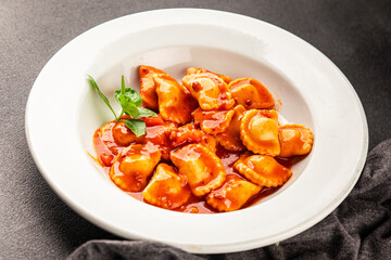 Ravioli beef tomato sauce second course fresh delicious gourmet food background on the table rustic food top view copy space