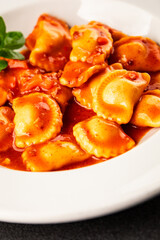 Ravioli beef tomato sauce second course fresh delicious gourmet food background on the table rustic food top view copy space