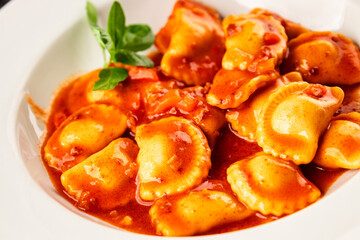 Ravioli beef tomato sauce second course fresh delicious gourmet food background on the table rustic food top view copy space
