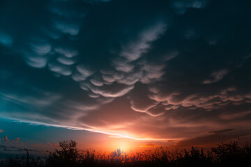 landscape with thunder and mammoth clouds in the sky