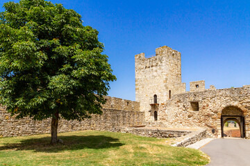 A quiet corner of Kalemegdan Fortress featuring Despot Stefan's angular tower and open Despot's...