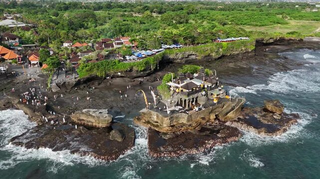 Aerial View of Pura Tanah Lot Temple and Blue Ocean Waves, Bali, Indonesia
