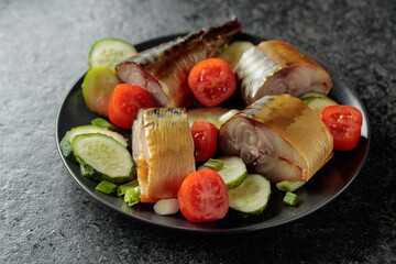 Smoked mackerel with fresh cucumbers, tomatoes and green onion.