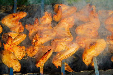 fried wings, charcoal  in grilled