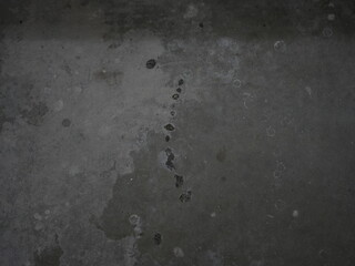 Grungy concrete surface with stains and weathered texture

