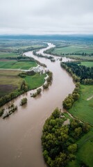 Aerial View Of Winding River Through Lush Green Landscape. Scenic Natural Beauty And Environmental Tranquility