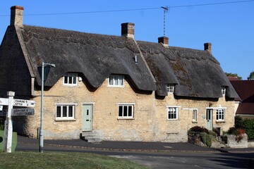 Thatched cottages, Church Street, Empingham, Rutland.