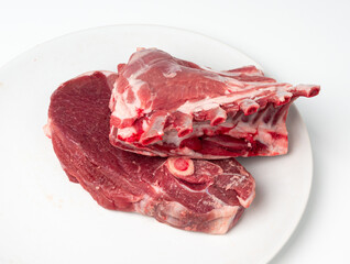 Raw lamb rack isolated, fresh mutton fillet with ribs, tenderloin pieces, mutton rump sirloin meat