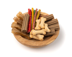 Assorted dog kibble, many canine food, different color dry pet food mix, various dog snack pile