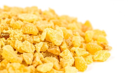 Close-up of dried, diced yellow spice