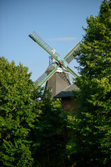 windmill in the netherlands, The windmill's powerful structure stands as a testament to classic engineering and a bygone era