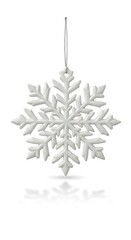 A decorative white snowflake ornament with intricate details, perfect for festive winter decorations. 