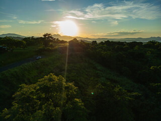 Aerial Sunset Over North Queensland Mountains and Farmland &ndash; Scenic Farmland Landscape, Misty Afternoon Light, Tropical Rural Beauty, Nature Photography, Australian Countryside, Farming Aerial View