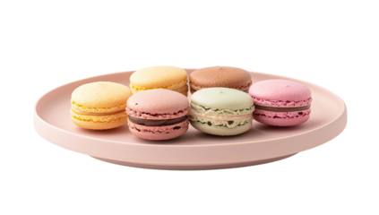 Colorful macarons on a pastel pink plate