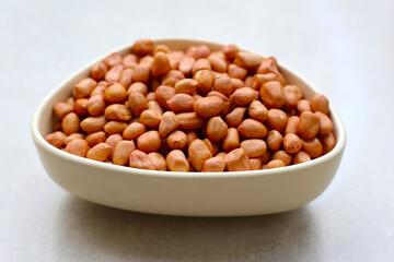 Raw peanuts with red skin