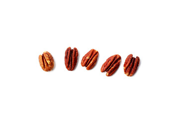 Delicious salted pecan nuts scattered.