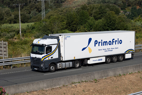 Pontevedra, spain 08 08 2025 primafrio mercedes-benz actros truck transporting goods on highway