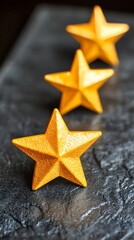 Three Golden Stars on Dark Background Luxury Award Concept