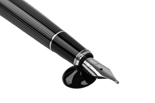 Close-up of a black fountain pen, showing nib and ink drop